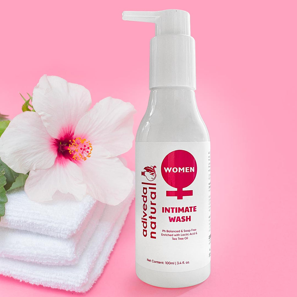 Woman using intimate wash | pH balanced feminine cleanser | Hygiene for intimate areas | 100ml women's care product | Balanced pH wash for women | Natural intimate hygiene | Gynecologist-recommended cleanser | Soothing female hygiene | Organic intimate wash | Sensitive skin care product | Gentle daily cleansing | Feminine health solution